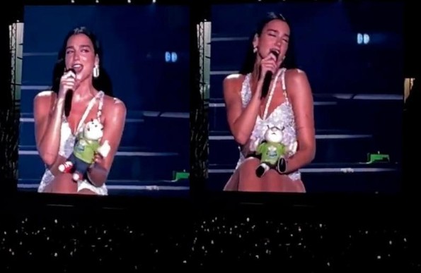 ¿La habrán regañado sus managers? Dua Lipa sorprende cantando con un Dr. Simi en brazos